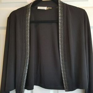 Black shrug